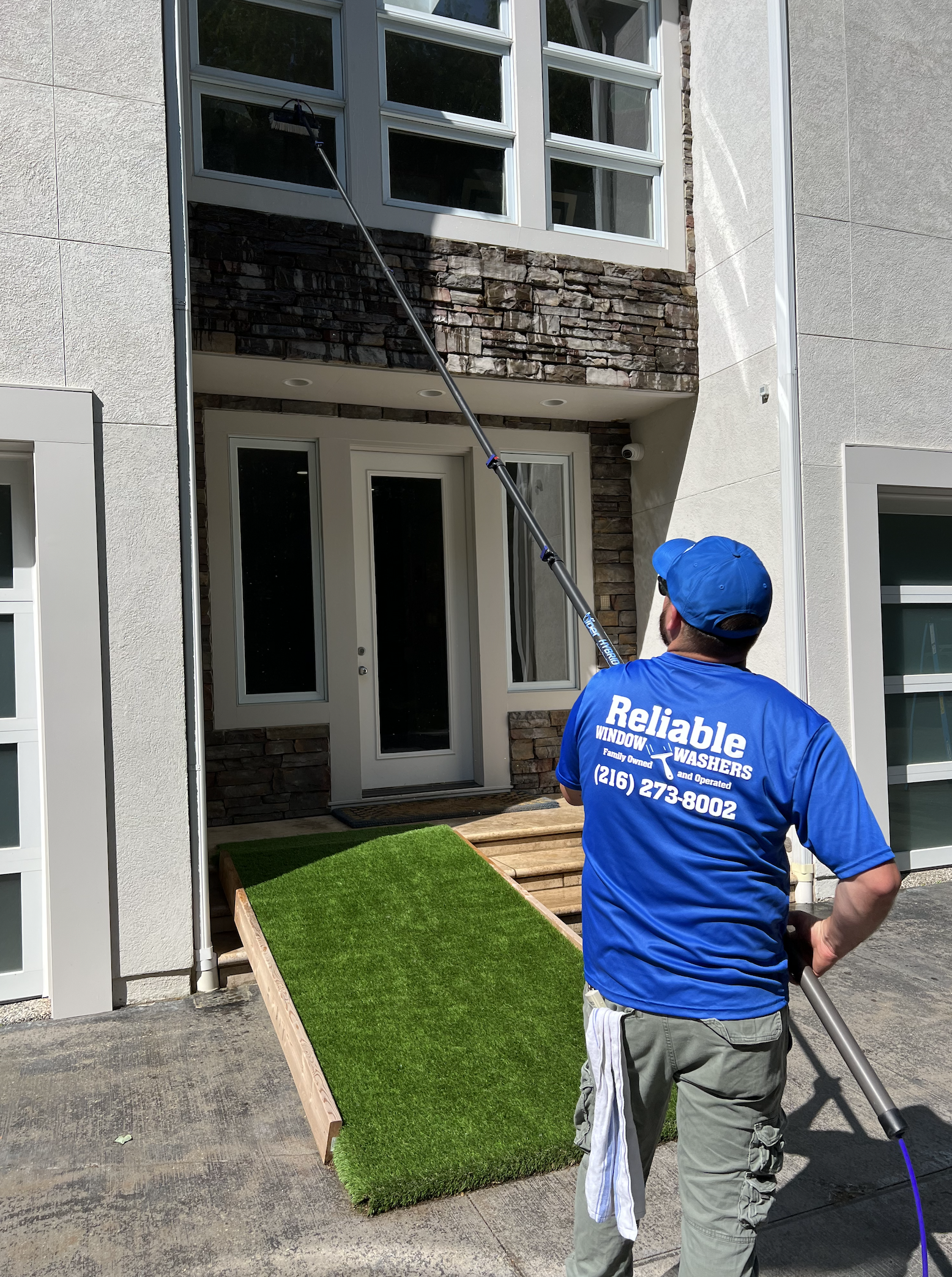 Professional window cleaning in progress