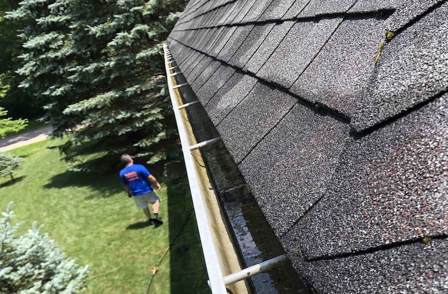 Clogged gutter causing overflow