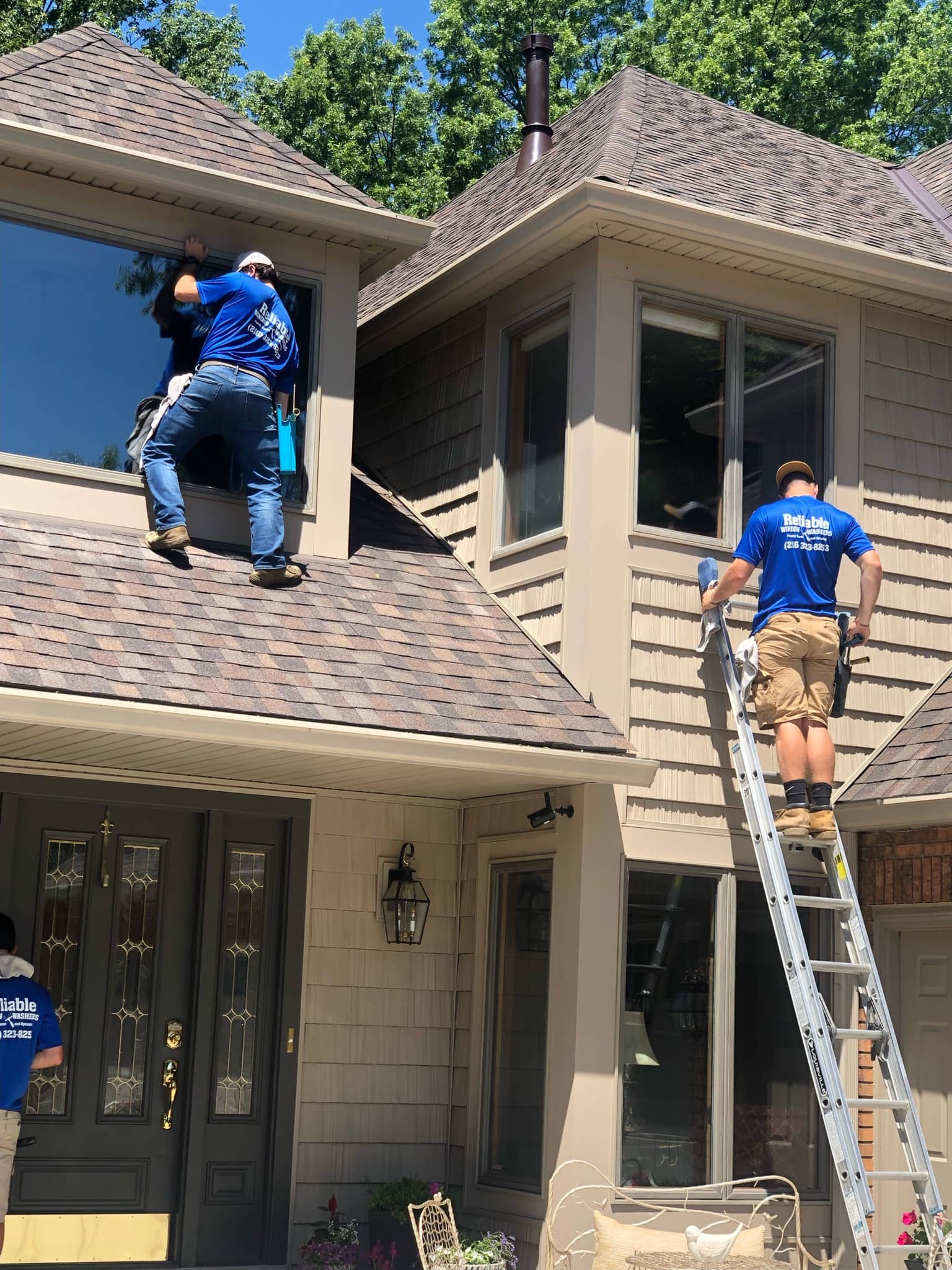 Reliable Window Washers cleaning service team at work