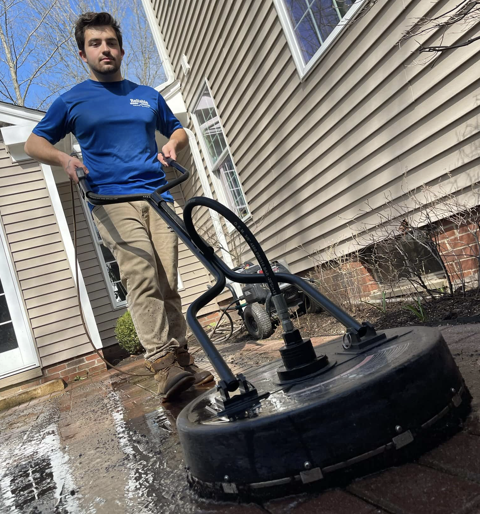 Freshly cleaned and sealed concrete driveway